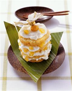 Small pineapple cake with cream and Physalis