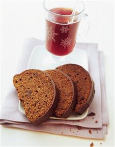 Spice cake with chocolate icing and red wine punch