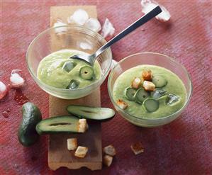 Cold avocado soup with garlic and croutons