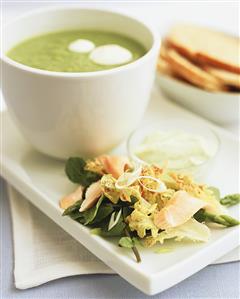 Pea soup and green salad with salmon