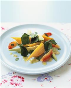 Avocado salad with carrots and pink grapefruit