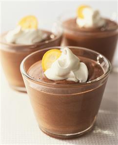 Chocolate mousse with kumquats and cream