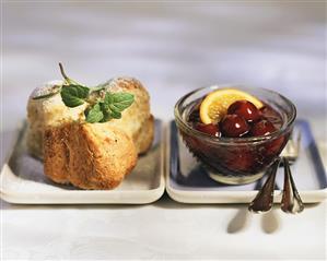 Sweet nut rolls with cherry compote