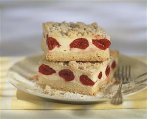 Two pieces of cherry crumble cake