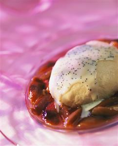 Yeast rolls with chocolate & poppy seed sauce on plum compote