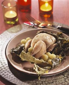 Quail, cooked in vine leaves, with green grapes