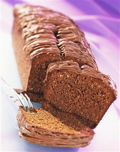 Chocolate nut cake, partly sliced