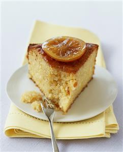 Piece of lemon almond cake with candied lemon