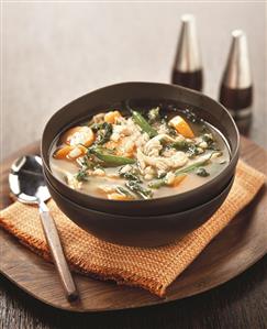 Chicken broth with pearl barley and vegetables