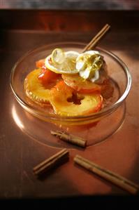 Glazed apple rings with cinnamon and cream