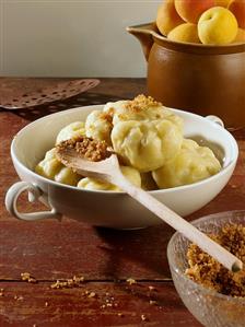 Apricot dumplings with buttered breadcrumbs