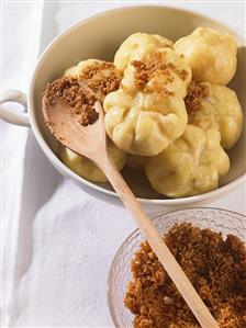 Apricot dumplings with buttered breadcrumbs