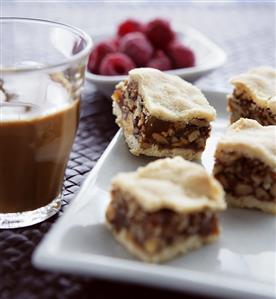 Chocolate nut cake, coffee and raspberries