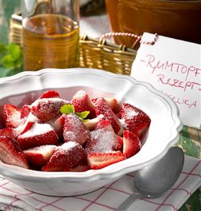 Sugared strawberries for Rumtopf (fruit and sugar in rum)