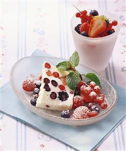 Yoghurt terrine with red berries and icing sugar