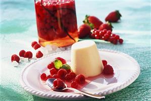 Vanilla blancmange with berries preserved in schnapps