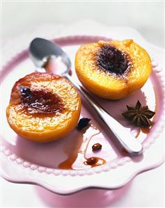 Poached peaches with syrup and star anise