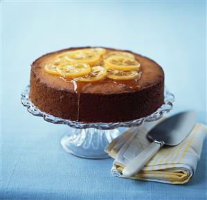 Lemon polenta cake on cake stand