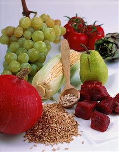 Still life with fruit, vegetables, meat and cereals