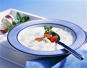 Cold cucumber and soft cheese soup with garlic