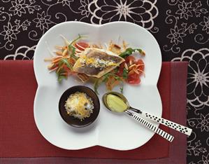 Branzino on vegetables with lemon salt & frozen olive oil