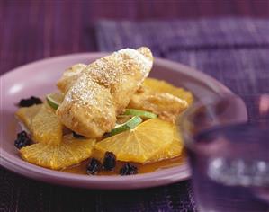 Banana and coconut fritters with orange salad