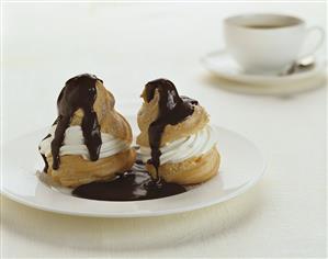 Profiteroles with cream and chocolate sauce