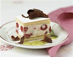 Raspberry slice with chocolate curls