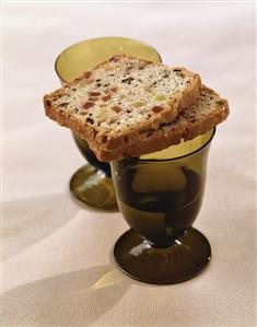 Two slices of ginger cake with dried fruit