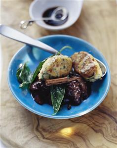 Ricotta dumplings with peppered plums and basil