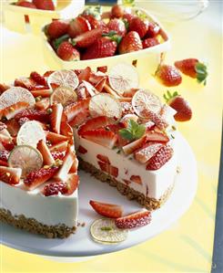 Strawberry & lime torte with amarettini base, a piece taken