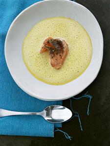 Carrot and ginger soup with peppered salmon