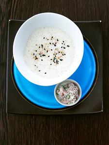 Potato and sesame soup with marinated shrimps