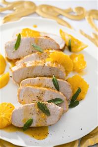 Pork fillet with orange and lemon sauce and sage