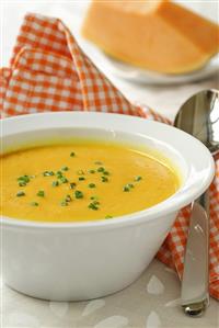 Pumpkin soup with snipped chives