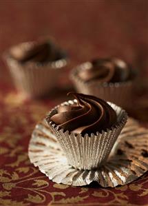 Ganache truffles in sweet cases