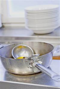 Remains of soup in a pan in a kitchen