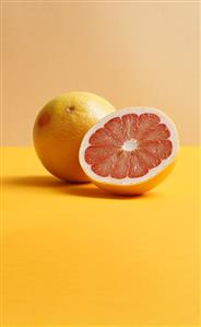 Pink grapefruit, whole and half