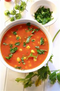 Tomato and sweetcorn soup with fresh parsley