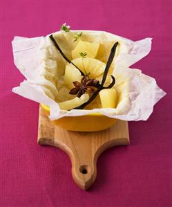 Cooked pineapple chunks with star anise, vanilla pods, thyme