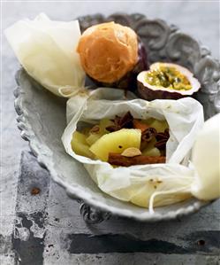 Pineapple chunks and spices baked in parchment paper