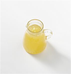 Pear syrup in glass jug