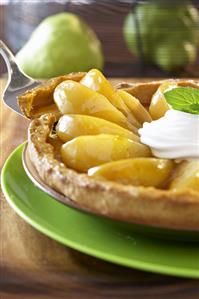 Pear tart with whipped cream