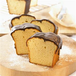 Madeira cake with chocolate icing, cut into pieces