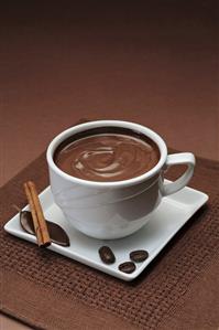 Chocolate sauce in white cup