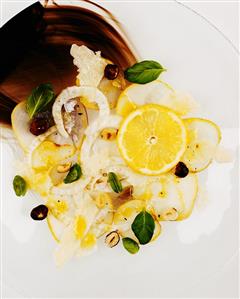 Fennel and pear carpaccio with lemon and hazelnuts