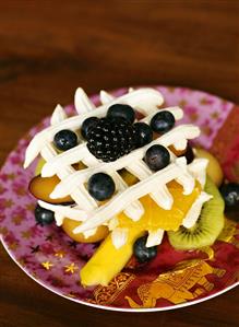 Fruit salad with cream lattice