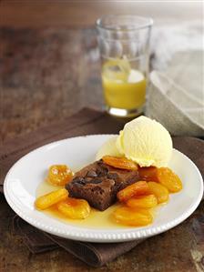 Brownie with apricot compote and vanilla ice cream