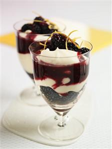 Two glasses of lemon and blackberry cream