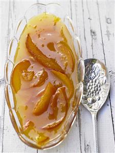 Orange marmalade in a glass dish